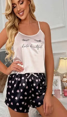Two-Piece Satin Pajamas - With Hearts Print On The Shorts And Eyelashes Print On The Top - Divarouj